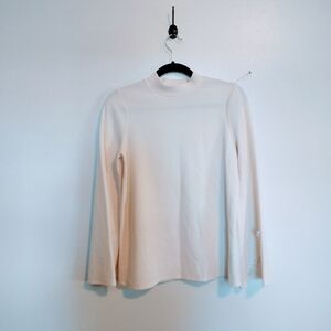 Kensie mock neck turtleneck cream ribbed long sleeve top with detail in flared s